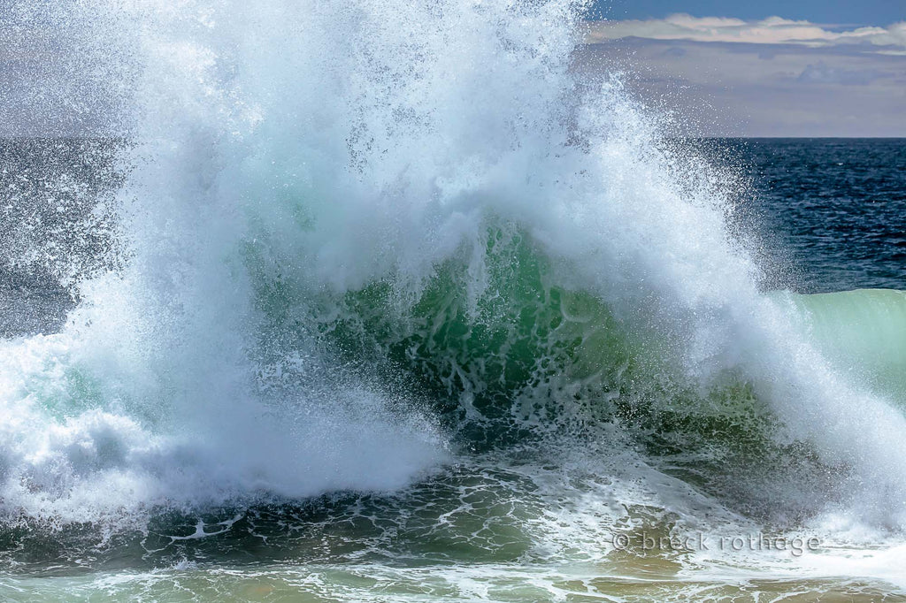 The power of a monster, Laguna Beach wave and the force it bursts upon the shore is the subject of this fine artwork. The deep blue of the ocean on the horizon is interrupted by the fierce explosion of sea spray intertwined with the emerald green surf.