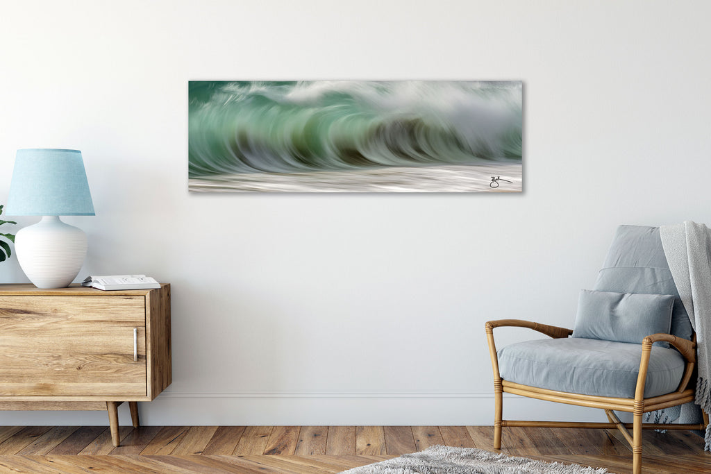Rolling Pacific Fine Art is the latest addition to The Impressions Collection — our most popular artworks for coastal interior design. The high elegance of this fine art makes it a standout for luxury, coastal applications. Generous with deep greens and swaths of turquoise, this wave is exquisitely balanced with sweeping, sandy tans from the shore beneath this shore breaking wave. 