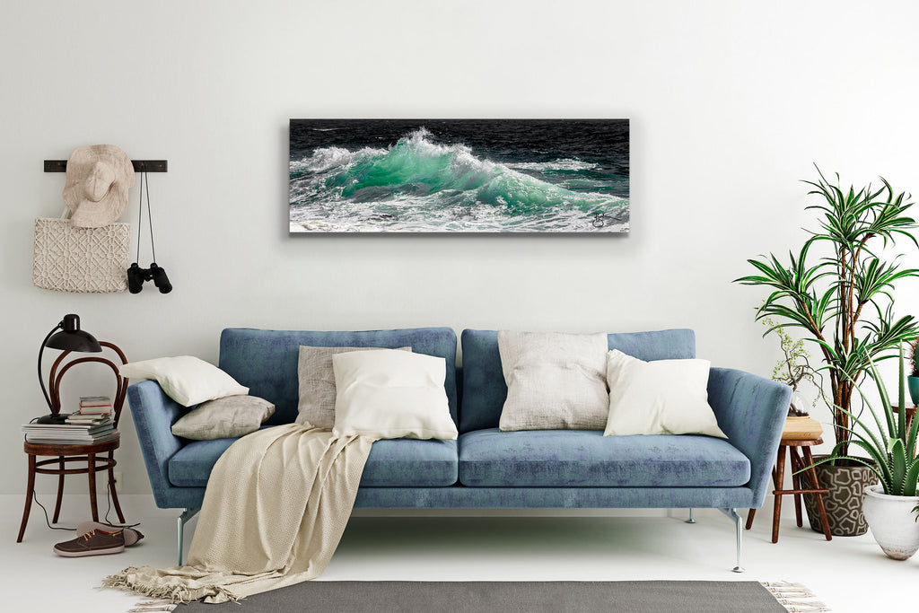 A watery peak of icy clear, aquamarine waves dance off the California coast with the deep blue in the distance. Aquamarine Rising fine artwork is resplendent with different tonal aquas and blues, reaching up to hints of emerald with incredible wisps of sea spray twirling in the ocean breeze. 