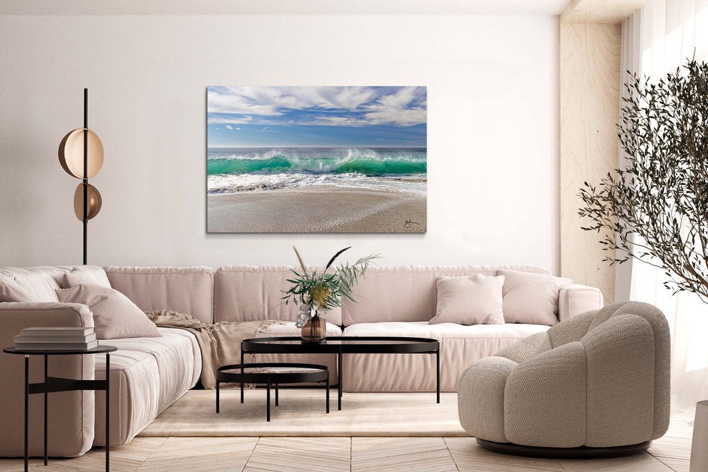 Christmas in Laguna coastal fine art on metal canvas is like a perfect day at the beach. The crystal turquoise water shot-through with sunlight dances toward the shore with the most perfectly beautiful wave cresting at center-frame. It's an elevated spin on coastal fine art by Laguna Beach artist Breck Rothage.