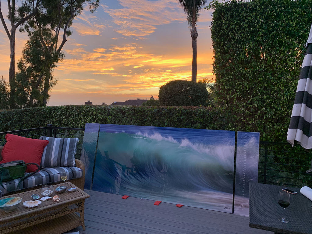 A Laguna Beach sunset above a soon-to-be-hung 10 ft. Watercolor Wall.